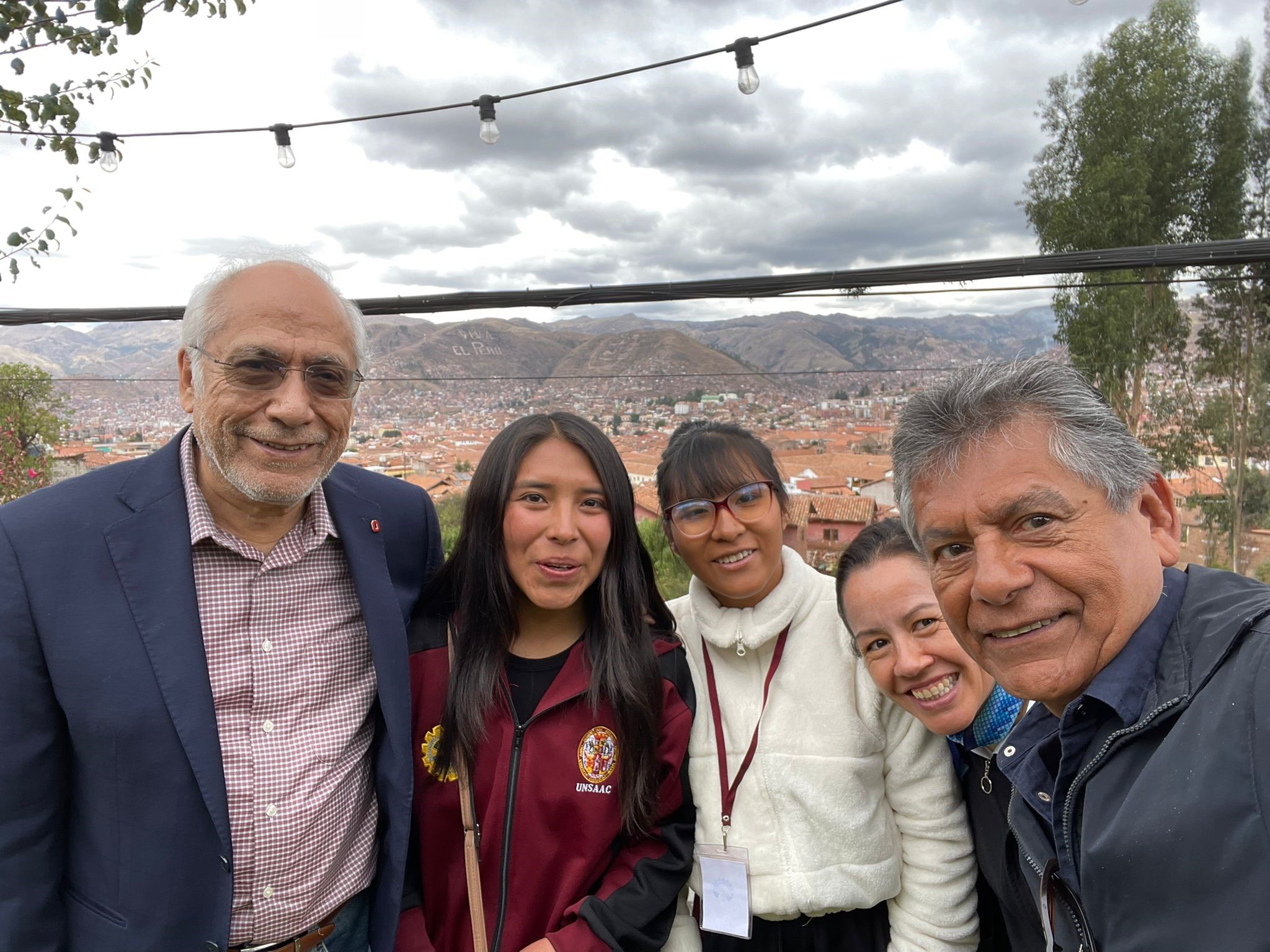Two professors and three students in Peru