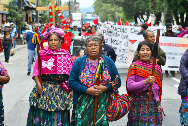 three indigenous Guatemalan women protesting