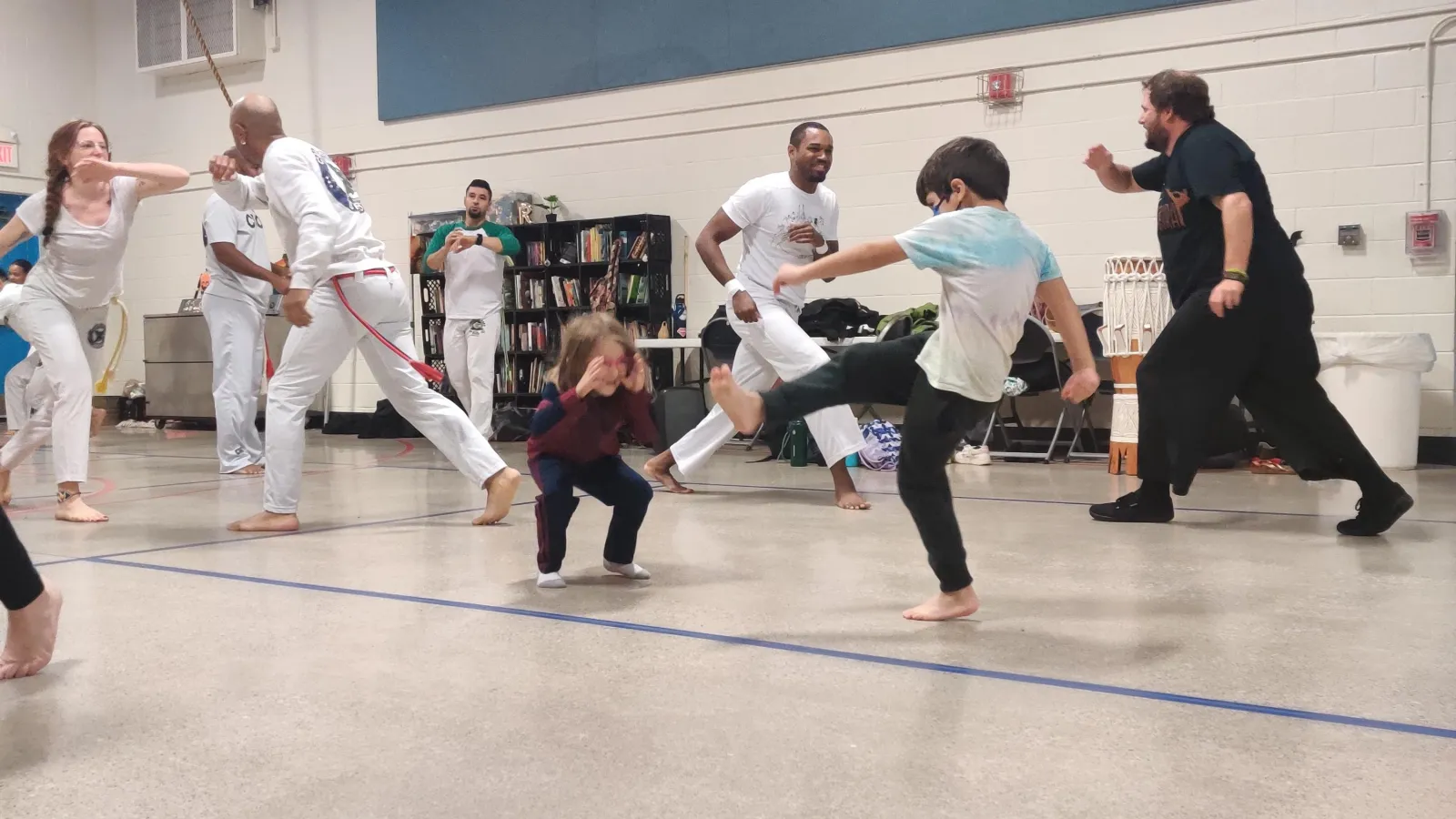 Kids playing capoeira