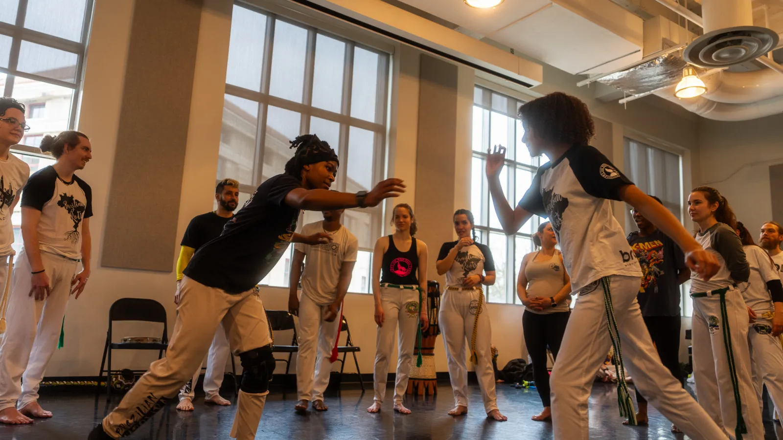 People participating in a capoeira class at The Ohio State University
