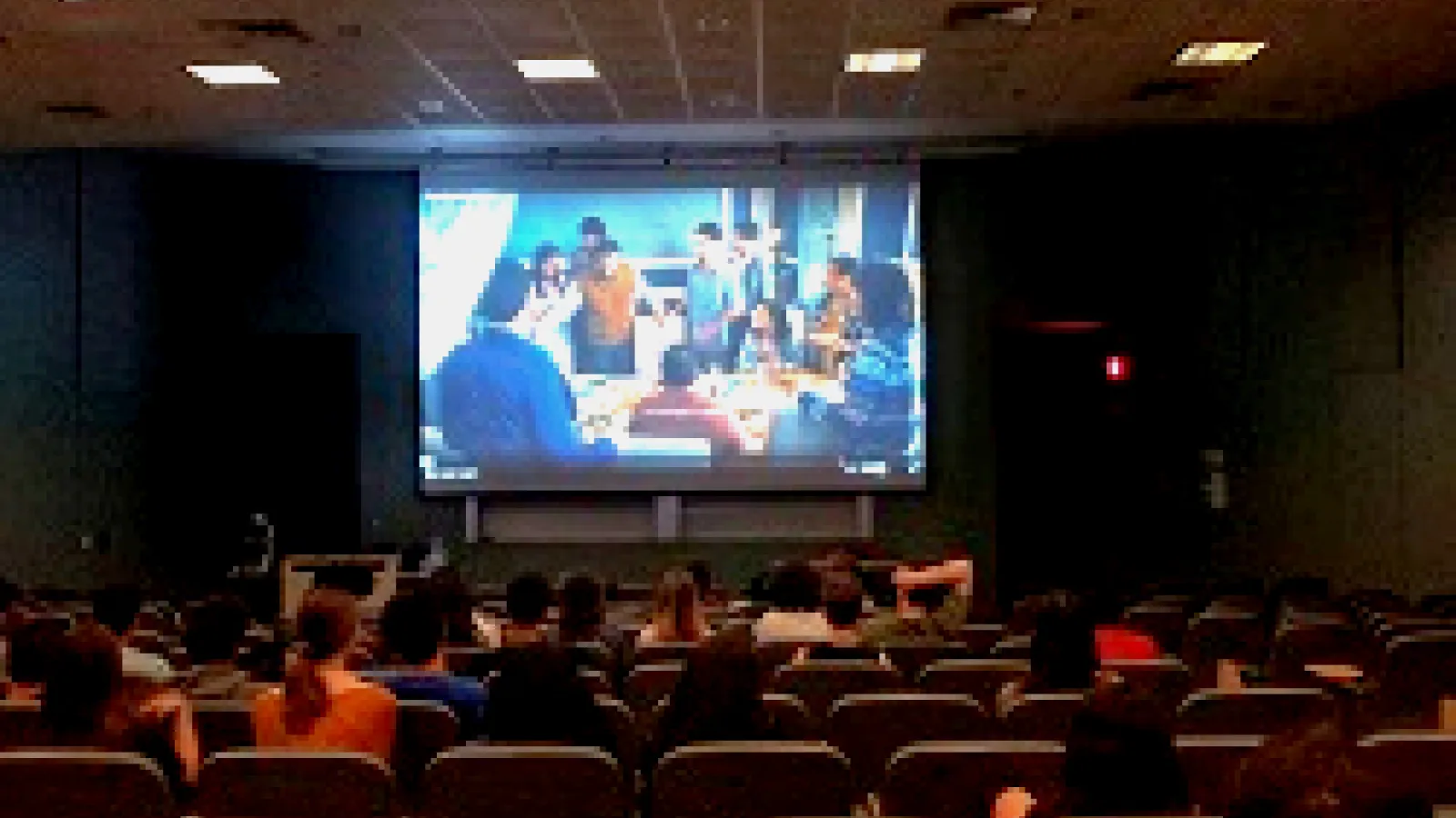 High School Students watching the movie Nosotros los nobles in a lecture hall