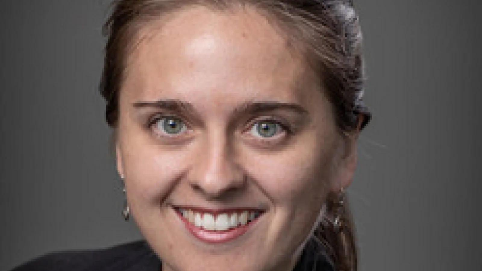 Professional headshot of Stacey Alex