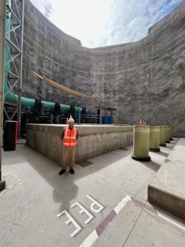 Hardy in front of a desalinization plant