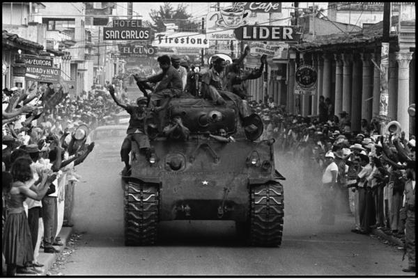 Burt Glinn Castro and his people were coming in from the Sierra Mastre using any transport they could find including a tank that belonged to Batista'. Santa Clara, Cuba. 1959. © Burt Glinn | Magnum Photos
