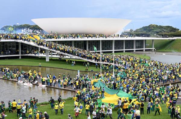 Rioters storming the Brazilian congress (Boston Globe)