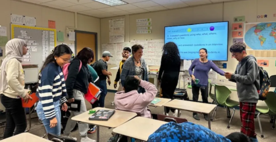 teacher and students in classroom activity
