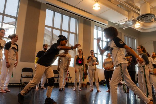 People participating in a capoeira class at The Ohio State University
