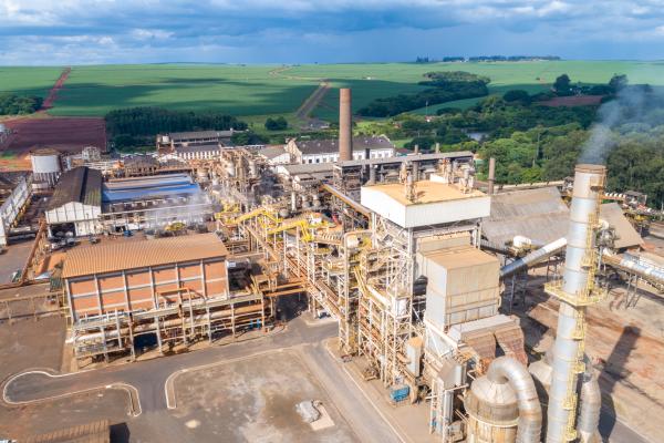 Sugar cane industrial mill processing plant in Brazil. Sugarcane plant producing renewable energy. Ethanol.