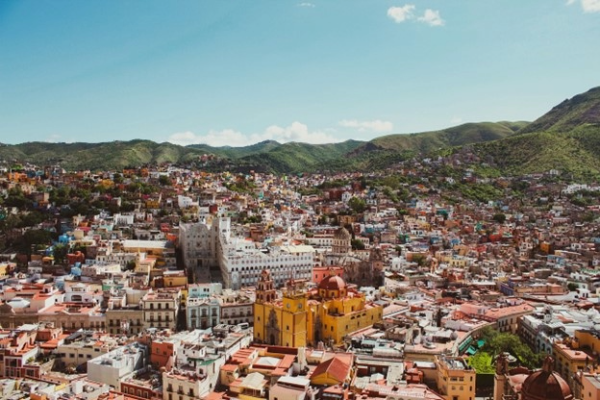A town at the base of some hills.