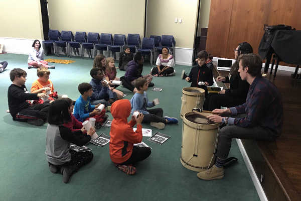 Students playing drums 